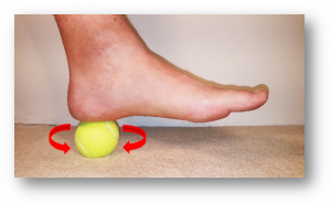 Massaging Your Heel with a Tennis Ball