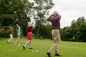 Golfers Hitting Golf Balls with Heel Pain Playing Golf