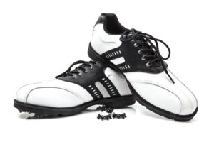 Golf shoes with spare spikes 