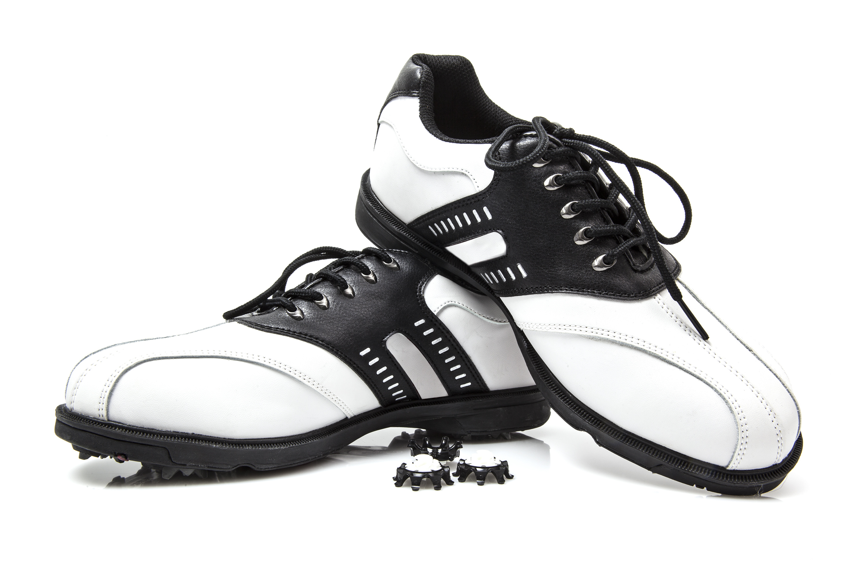 Golf shoes with spare spikes Foot & Leg Centre