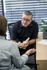 Practitioner talking to patient